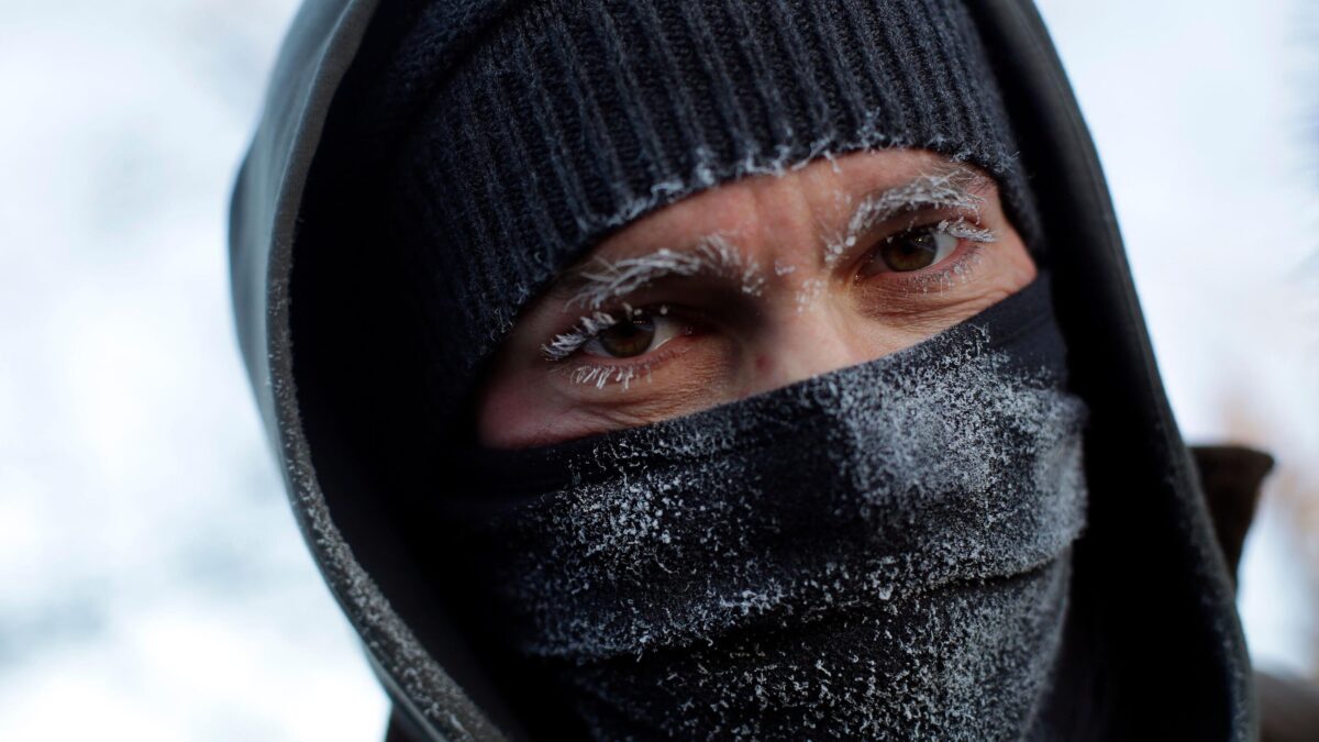 Frank Lettiere's eyebrows and eyelashes froze after his walk along Lake Michigan's Chicago shoreline Wednesday. Frostbite warnings were issued for parts of the U.S. Midwest as temperatures plunged.