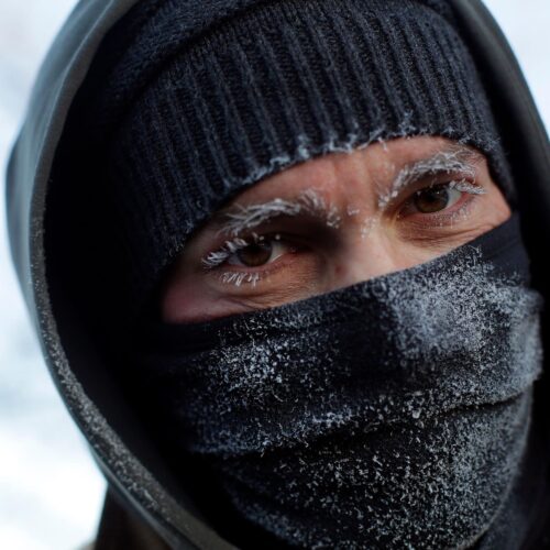 Frank Lettiere's eyebrows and eyelashes froze after his walk along Lake Michigan's Chicago shoreline Wednesday. Frostbite warnings were issued for parts of the U.S. Midwest as temperatures plunged.