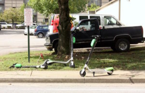 scooters on a sidewalk