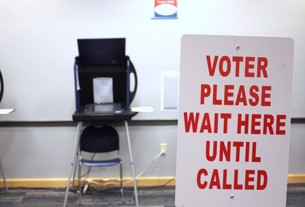 Nashville polling place with a "voter please wait here until called" sign