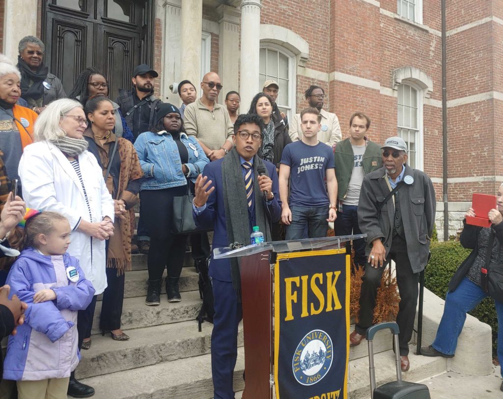 Justin Jones with supporters on the steps at Fisk University