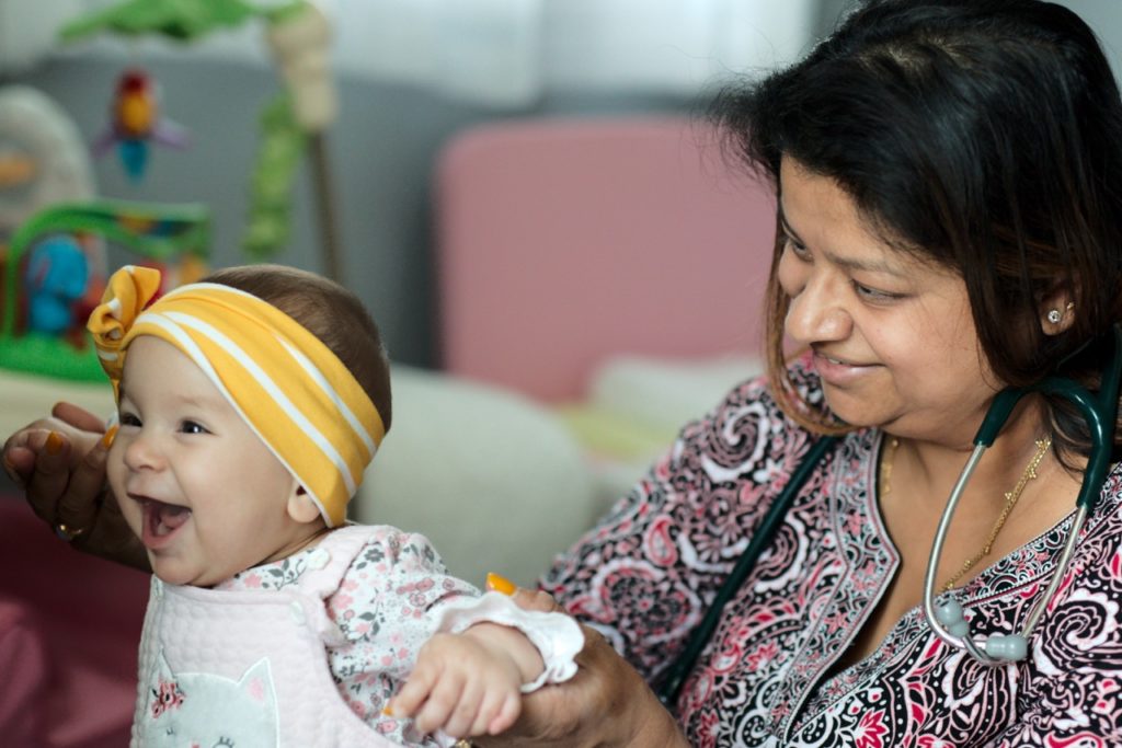 Dr. Vidya Bansal holding baby