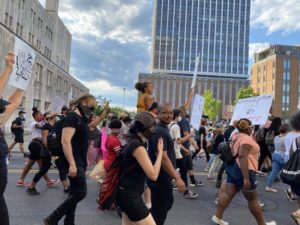 Marchers walk along Charlotte Avenue