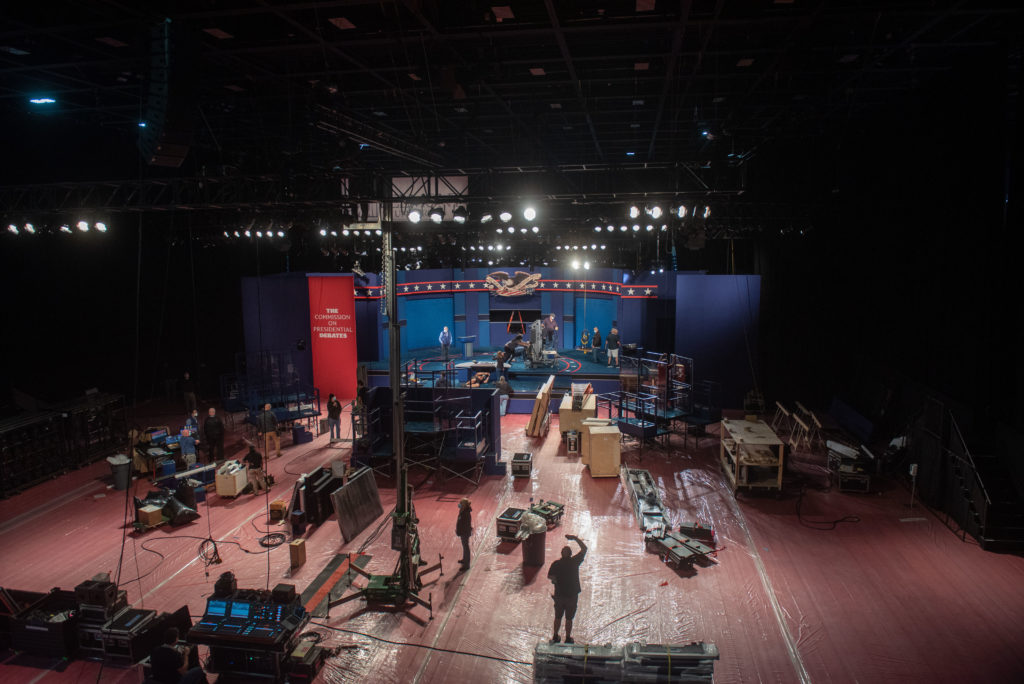 Crews build the stage for the presidential debate at Belmont University.