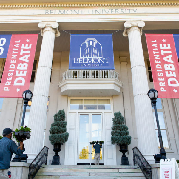 Banners for the presidential debate hang from a building on the campus of Belmont University.