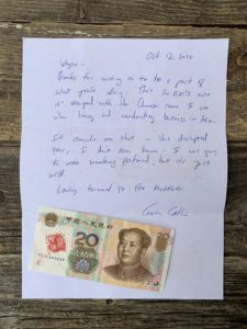A Chinese bank note and a handwritten letter