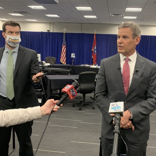 Gov. Bill Lee speaks to reporters during a break in budget hearings.