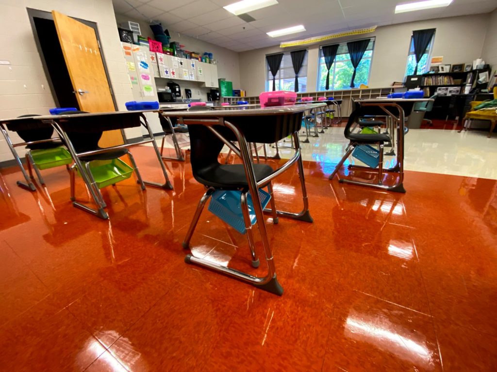 Empty desks in a classroom