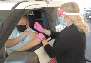 Dr. Lisa Piercey giving vaccination
