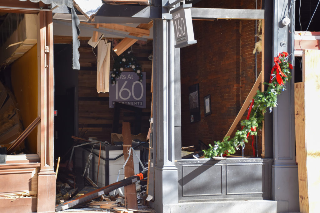 The lobby of Lofts at 160 seen from Second Avenue two weeks after the Christmas Day bombing less than a block away, which heavily damaged the residential complex.