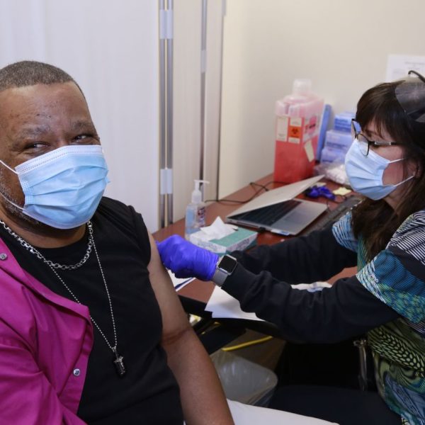 Veteran getting vaccine