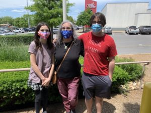 Xander Huff with mother and sister