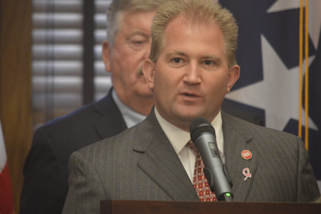 Rep. William Lamberth speaks at podium.