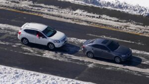 Stranded motorists wait for a tow on Interstate 95 in 2022 in Ladysmith, Va. A massive winter storm closed about 48 miles of the interstate.