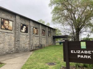 The side of Elizabeth Park senior center, featuring a series of wood mosaics portraying African American women of North Nashville.
