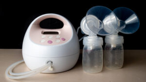 The photo shows a breast pump device