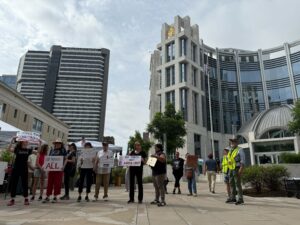 A group of protesters outside of a federal courthouse building in downtown Nashville.
