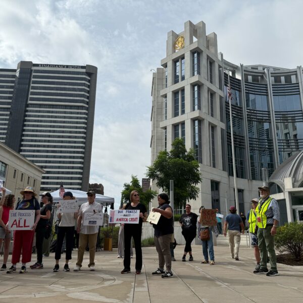 A group of protesters outside of a federal courthouse building in downtown Nashville.