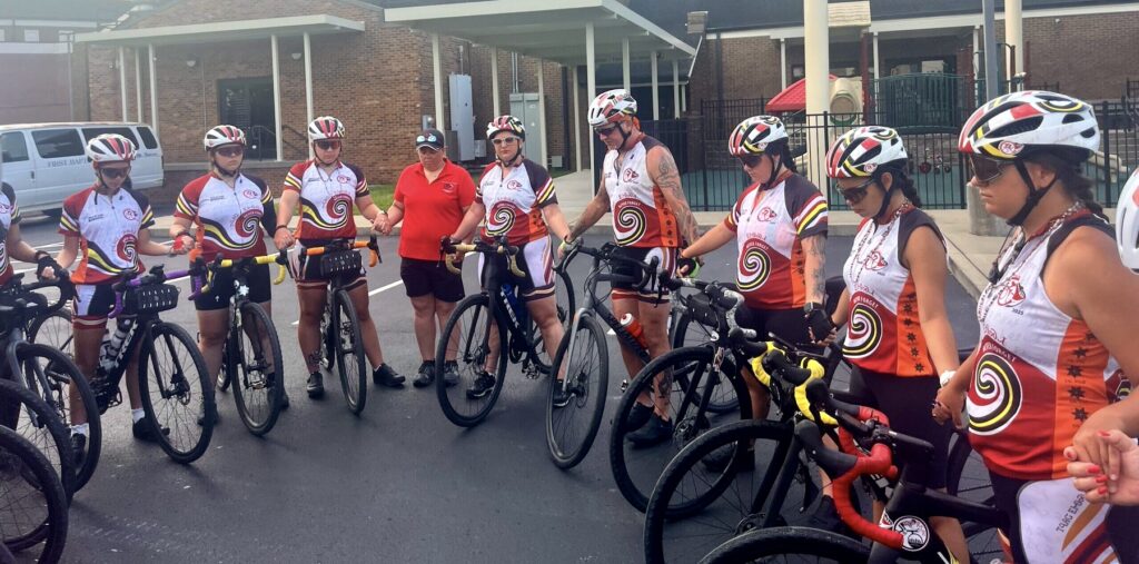 bicycle group prayer circle photo