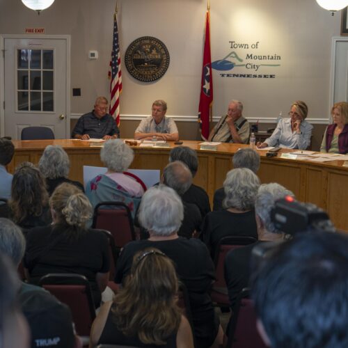 The Mountain City Board of Mayor and Aldermen hear from locals at a town hall meeting on Thursday, Aug. 7, 2025. In a packed room of 50, 11 residents voiced their concerns that plans to build a 30 megawatt bitcoin mine in a residential part of Mountain City were being rushed by city leaders without proper input from the people who live nearby.