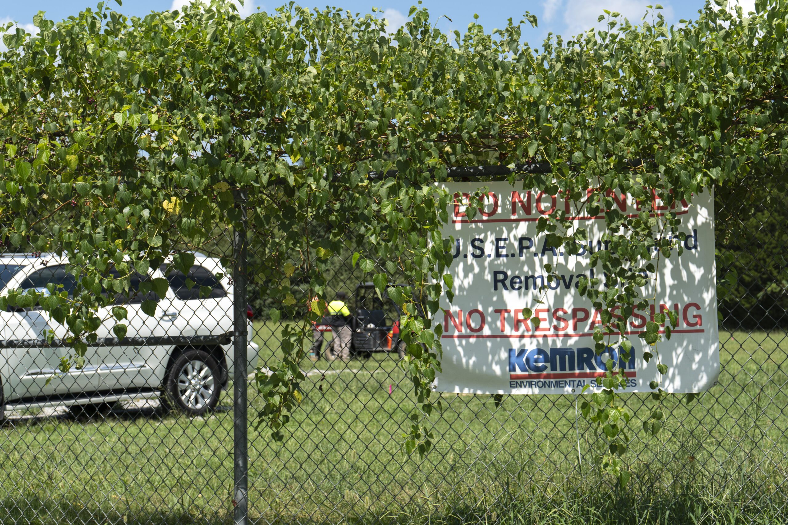 An overgrown sign outside the former site of an American Nuclear Corporation facility in Clinton, Tenn. reading, “DO NOT ENTER, U.S. E.P.A. Superfund Removal Site, NO TRESPASSING,” as seen on Tuesday, Aug. 19, 2025. Representatives from the U.S. Environmental Protection Agency, Tennessee Department of Environment and Conservation and local government gathered in Clinton on Tuesday to celebrate the completion of cleanup at the site.