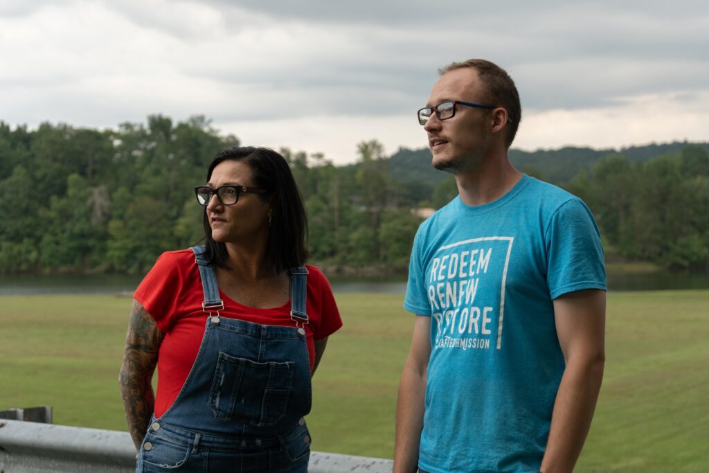 Scott County residents Lisa Wojcik (left) and Cody Cox (right) as seen at the Oneida City Park on Wednesday, Aug. 20, 2025. Together, the two attend government meetings and file public records requests that they post online, as part of a movement to unite Scott County, Tennessee and McCreary County, Kentucky they call the ‘Transparent Bridge Initiative.’