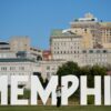 A woman takes a selfie in front of the Memphis, Tenn., skyline on Sept. 29.