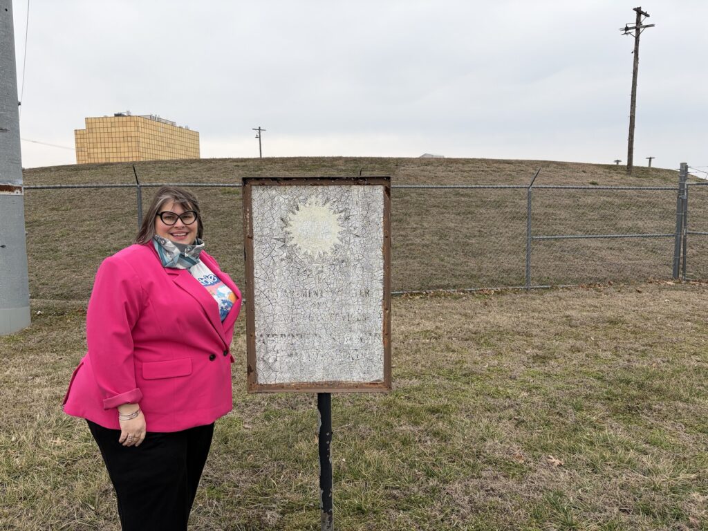 Sonia Fernandez LeBlanc in front of grassy mound
