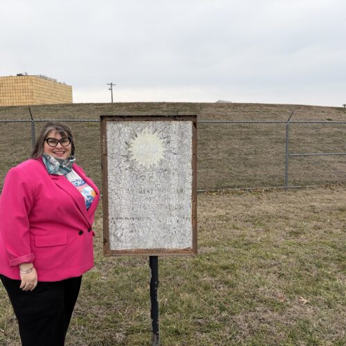 Sonia Fernandez LeBlanc in front of grassy mound