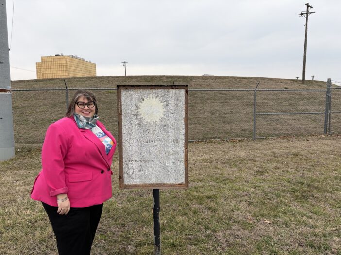 Sonia Fernandez LeBlanc in front of grassy mound