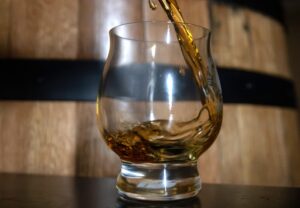 Bourbon pouring into glass