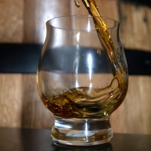Bourbon pouring into glass