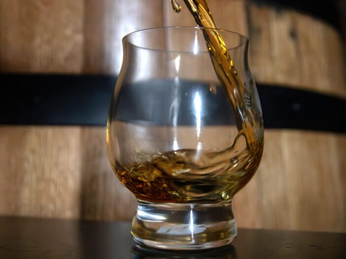 Bourbon pouring into glass