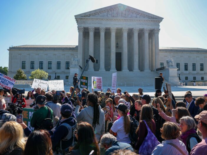 "The People vs the Poison" protesters gather at the U.S. Supreme Court on April 27, 2026 ahead of arguments in the case.