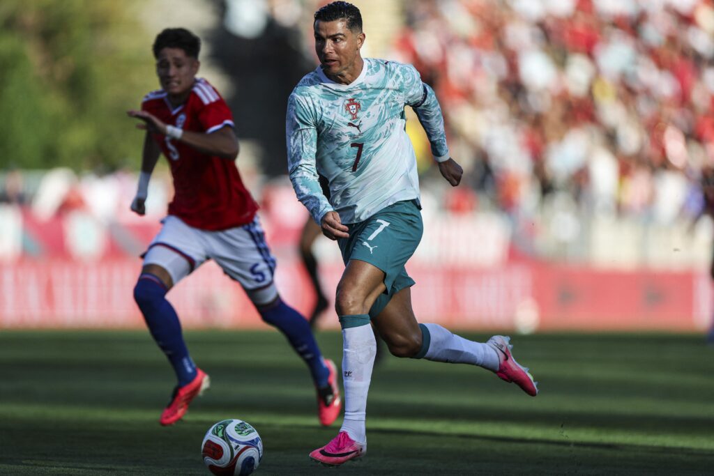 Portugal's Cristiano Ronaldo dribbles the ball during the international friendly football match between Portugal and Chile at Estadio Nacional do Jamor in Oeiras, on June 6.