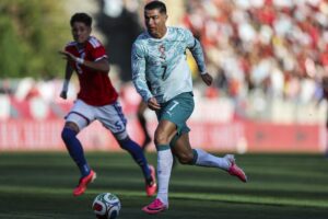 Portugal's Cristiano Ronaldo dribbles the ball during the international friendly football match between Portugal and Chile at Estadio Nacional do Jamor in Oeiras, on June 6.
