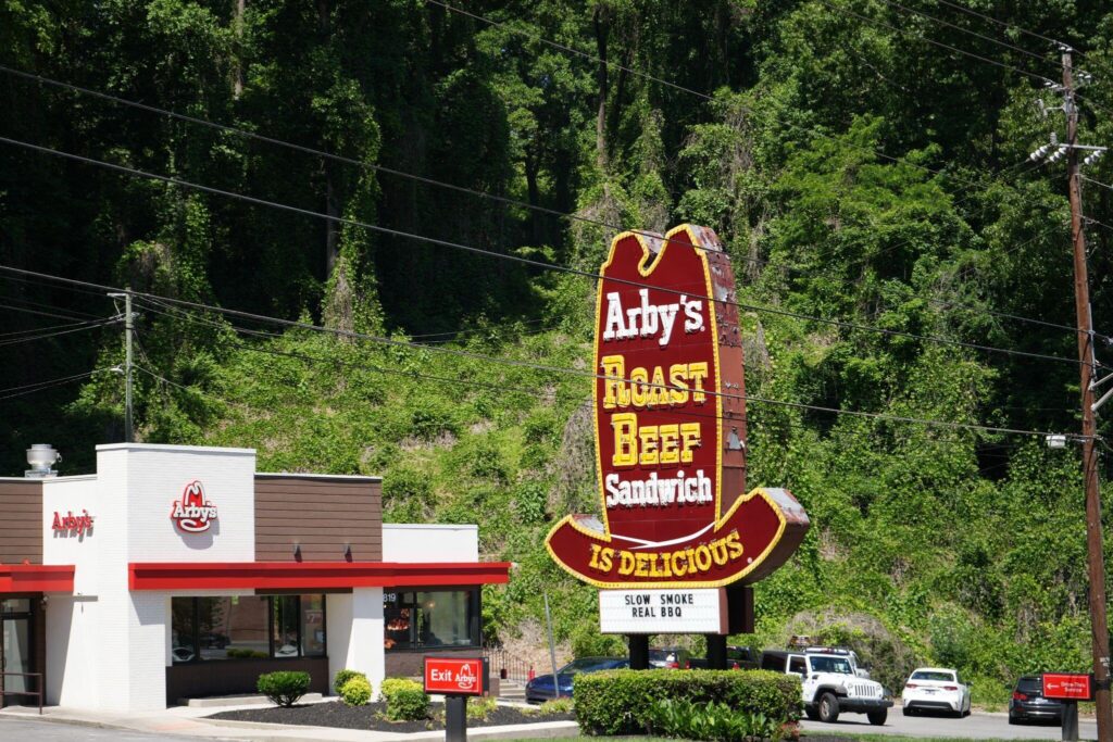 Kudzu covers a patch of woods behind an Arby’s in Knoxville, Tennessee on May 8th 2026.