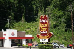Kudzu covers a patch of woods behind an Arby’s in Knoxville, Tennessee on May 8th 2026.