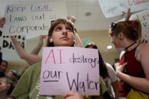 Alexandra Crawford holds a sign outside a planning commission meeting Thursday, June 11, 2026, in Nashville, Tenn. Nashville's Metro Council will hold a public hearing on the proposed regulations on Tuesday, July 7.