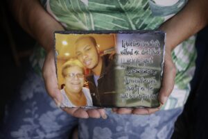 Cindy Leachman Aldridge holds a photo of her late grandson, Jonah Neal, at her home on July 12 in Owensboro, Ky.