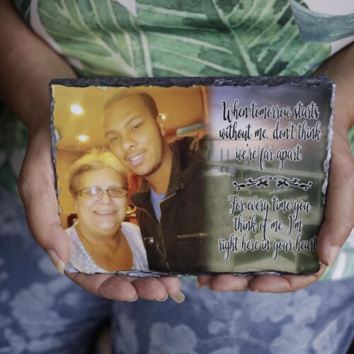 Cindy Leachman Aldridge holds a photo of her late grandson, Jonah Neal, at her home on July 12 in Owensboro, Ky.