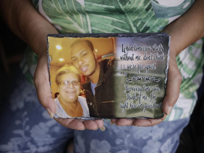 Cindy Leachman Aldridge holds a photo of her late grandson, Jonah Neal, at her home on July 12 in Owensboro, Ky.