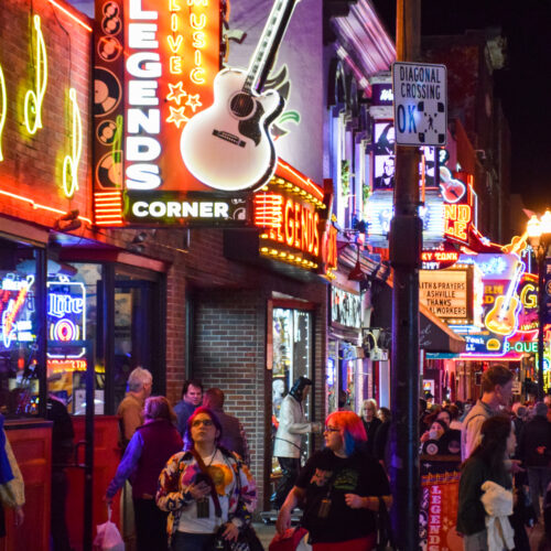 Lower Broadway's neon lights illuminate music fans downtown.
