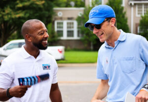 Chaz Molder talks with Memphis mayoral candidate Mickell Lowery at the polls on primary election day, August 6, 2026.
