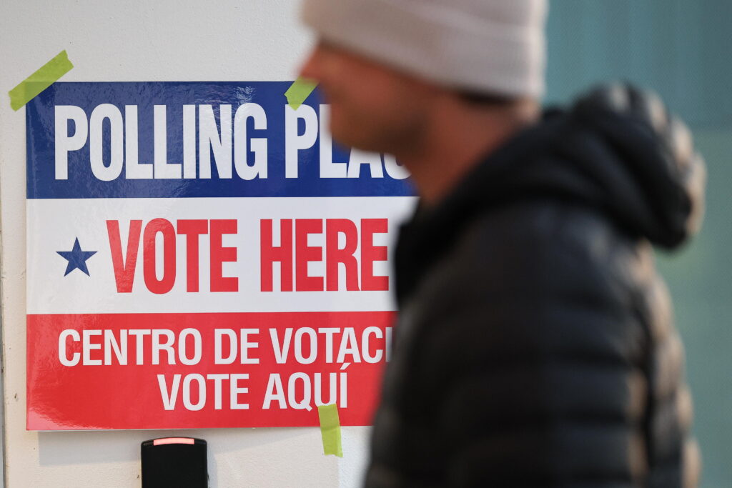 Voters arrive before casting their ballots at a polling location in Arlington, Va., on April 21. "This is my 22nd year [running elections]," one Colorado election official told NPR. "Absolutely, this is the most uncertain."
