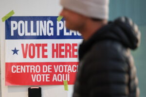 Voters arrive before casting their ballots at a polling location in Arlington, Va., on April 21. "This is my 22nd year [running elections]," one Colorado election official told NPR. "Absolutely, this is the most uncertain."