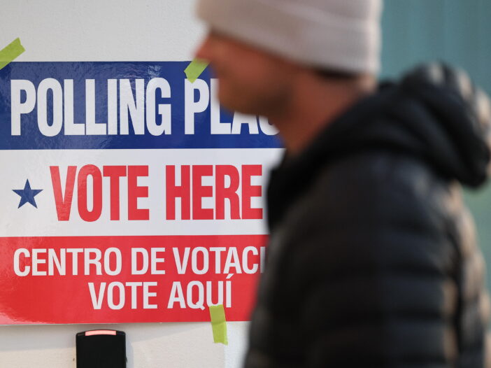 Voters arrive before casting their ballots at a polling location in Arlington, Va., on April 21. "This is my 22nd year [running elections]," one Colorado election official told NPR. "Absolutely, this is the most uncertain."