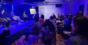 Audience members and panel for a Nashville Public Radio election event.