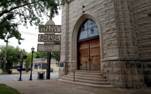 The Walnut Street Baptist Church is located at the corner of South Third and St. Catherine streets.